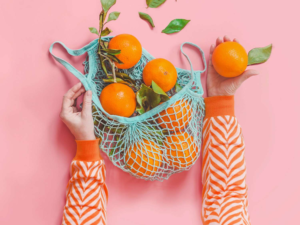 Oranges in a blue basket