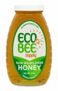 A jar of Eco Bee supply of Raw Wildflower Honey